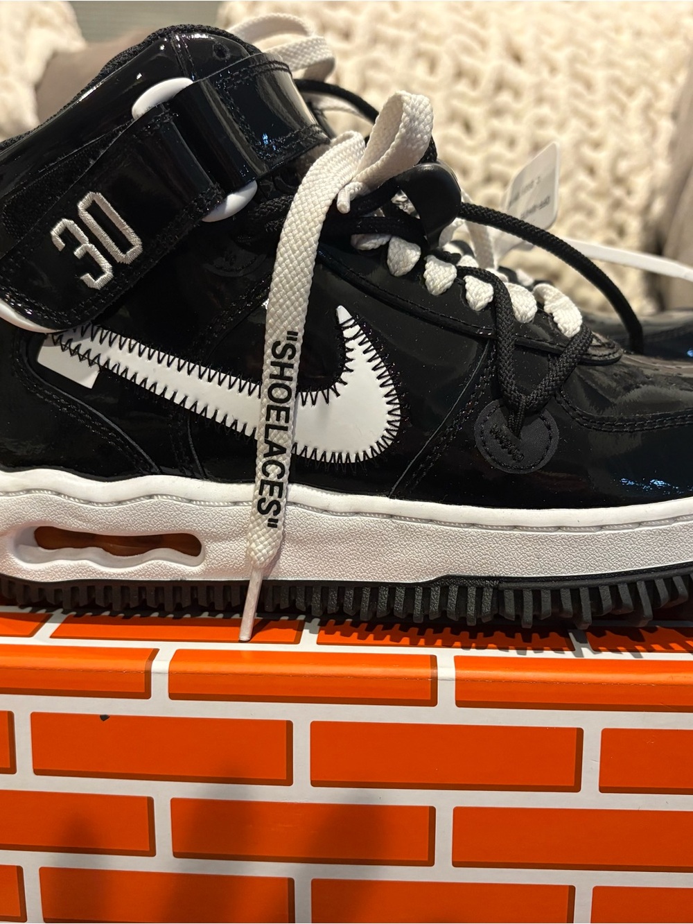 Nike Black and White High-Top Sneakers with Stitched Swoosh